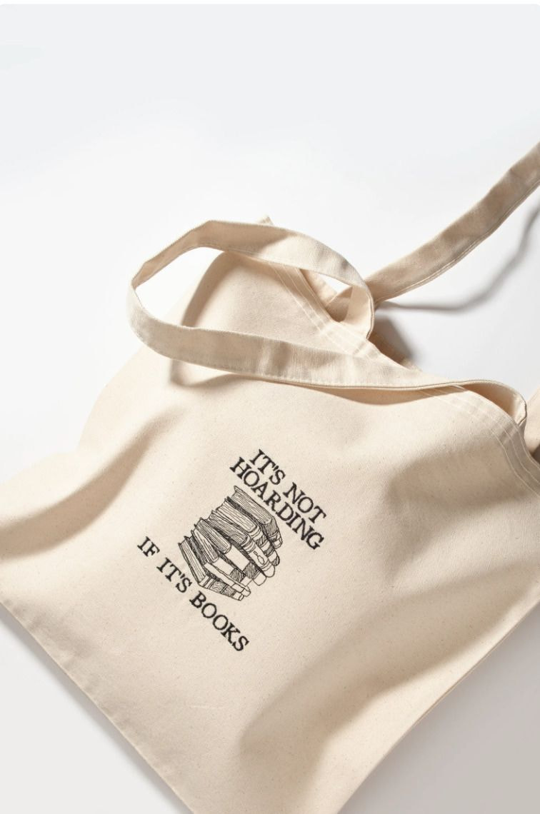 a white bag with a black text on it